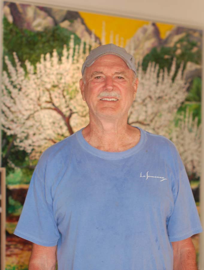 John Cleese in Alan's studio with Almond trees painting in background